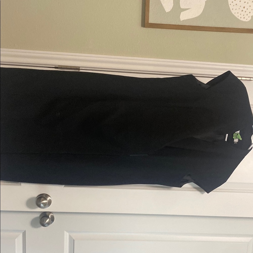 Black knee-length Calvin Klein wrap style  dress with cap sleeves and V-neck